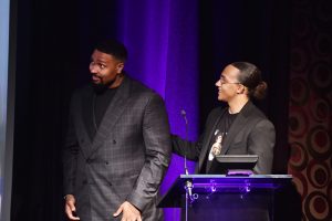 Award 25a - Jordan & Perri on stage winning moment