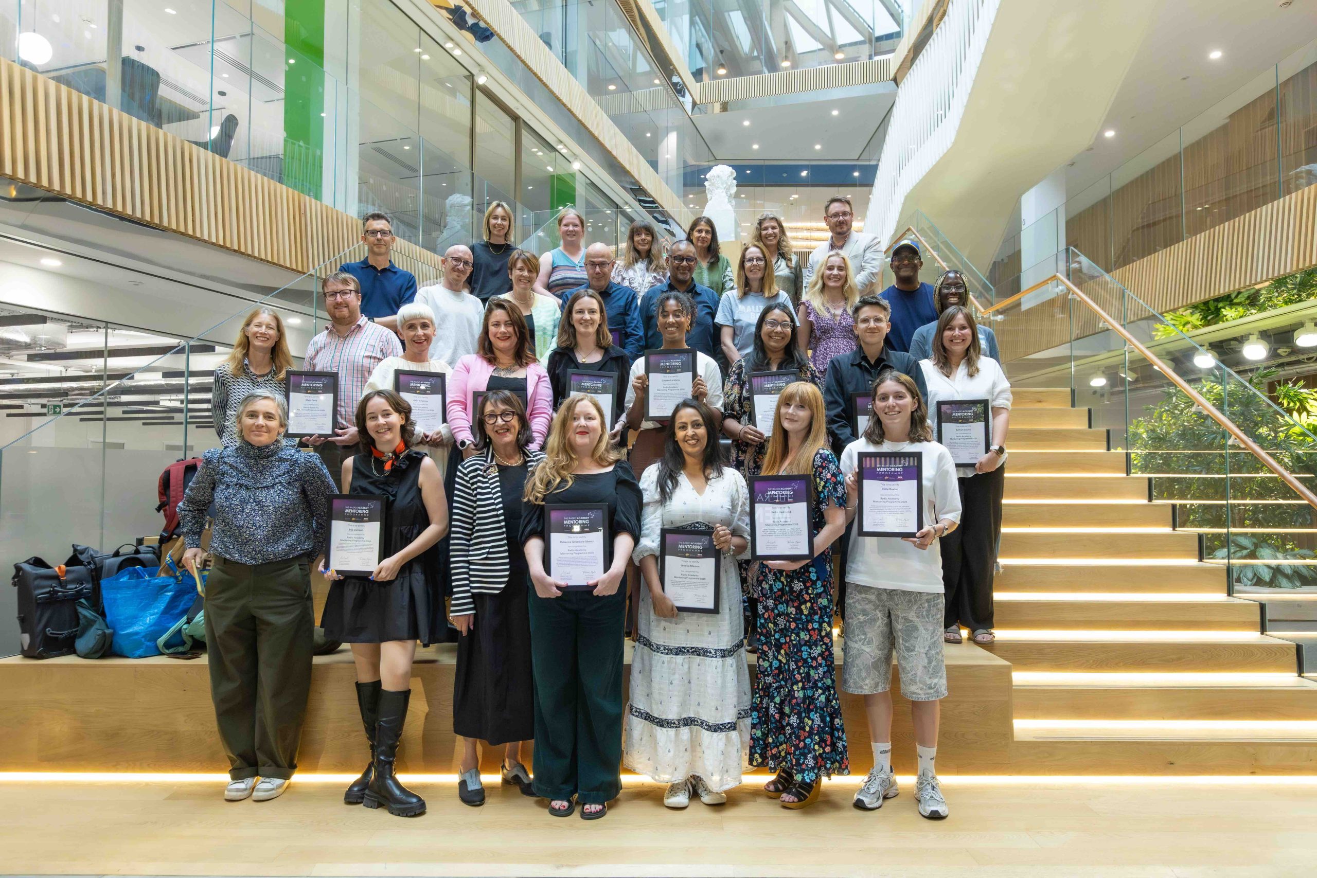 the 2025 graduates, mentors and Audio Academy team. Photo by Tricia Yourkevich